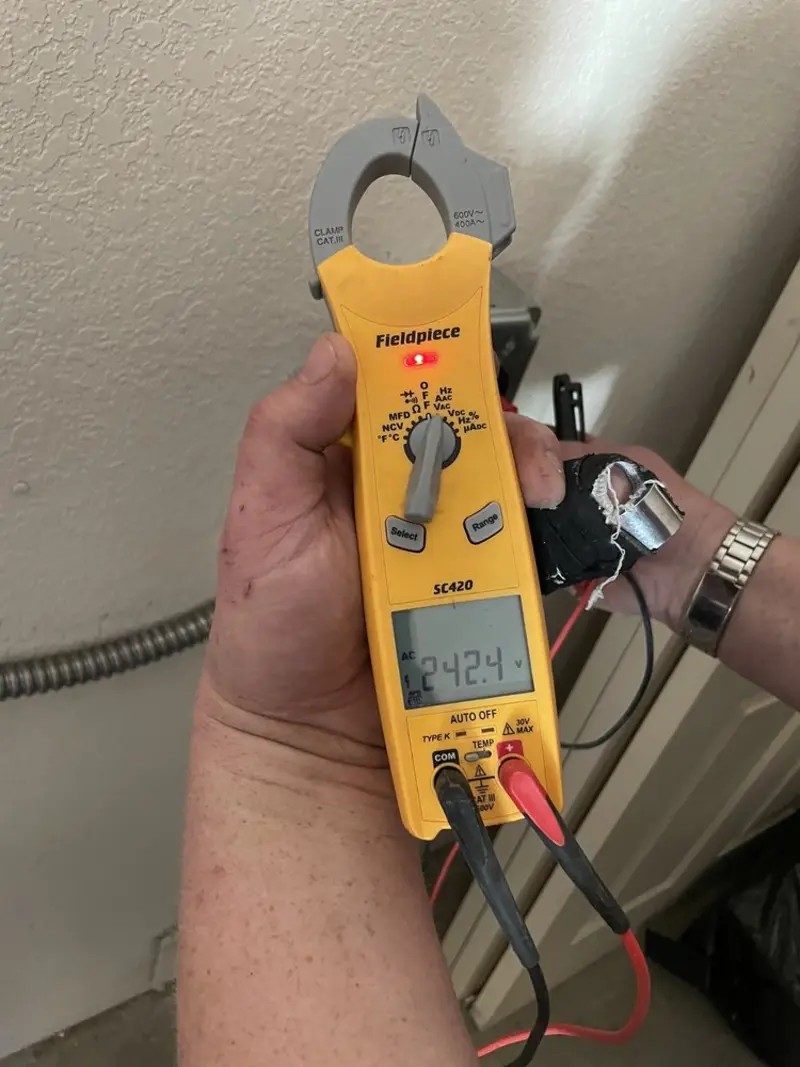 Voltage testing with clamp meter during Ceiling Fan Installation in Pinckneyville